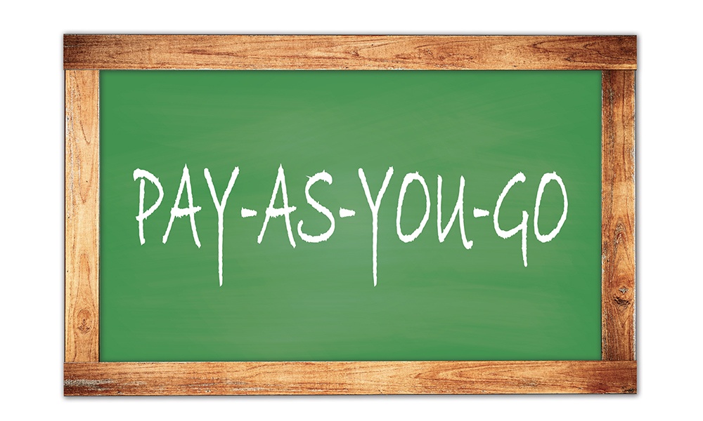 Pay As You Go - Close-up of a Chalk Board